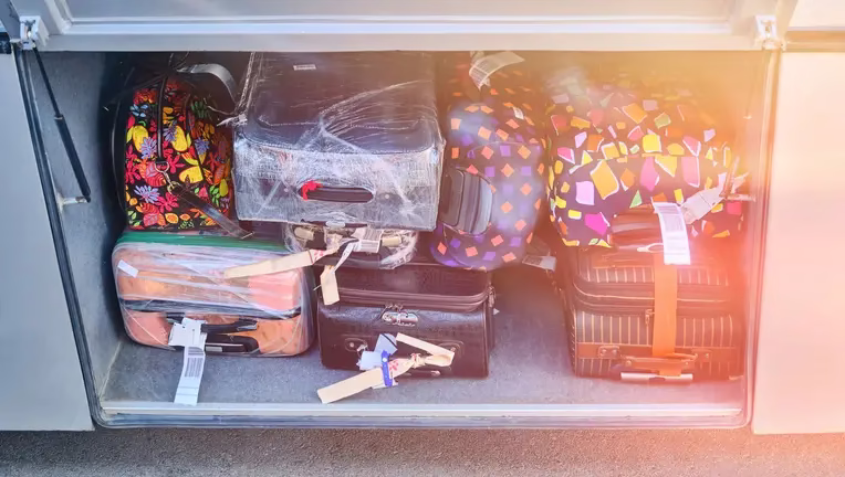 The girl was found alive in a suitcase stowed in bus luggage