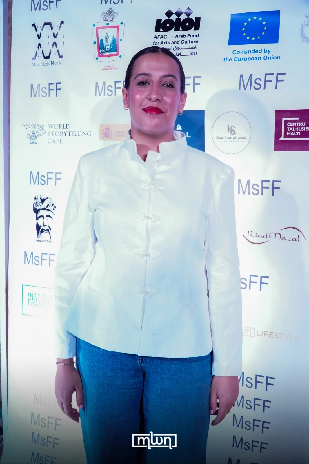 Abir Aboulmanadel, Arts Programs Manager at the British Council in Morocco, speaking about the AMANAR industry program and UK-Morocco film collaboration during MARRAKECHsFF 2026. / MWN Photography Team