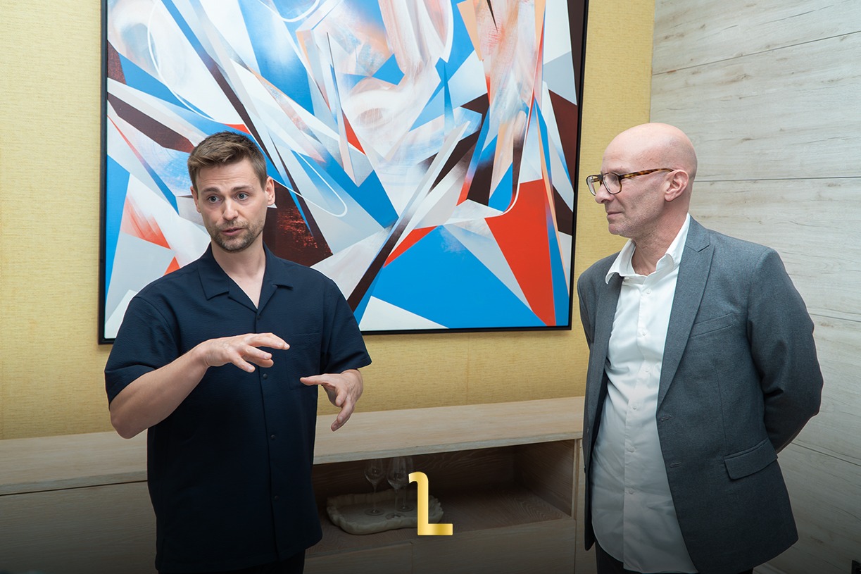 David Bloch, founder of David Bloch Gallery, stands with artist Théo Lopez during the opening of the exhibition at The Ritz-Carlton Rabat, Dar Es Salam / MWN Photography Team
