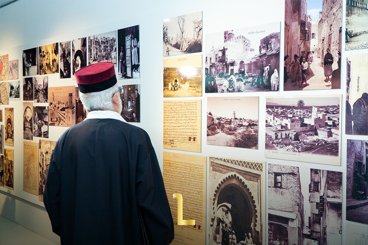 A rabbi who delivered a prayer during the inauguration explores a historical display tracing centuries of Moroccan Jewish life at the Museum of Moroccan Jewish Culture in Fez. / MWN Photography Team