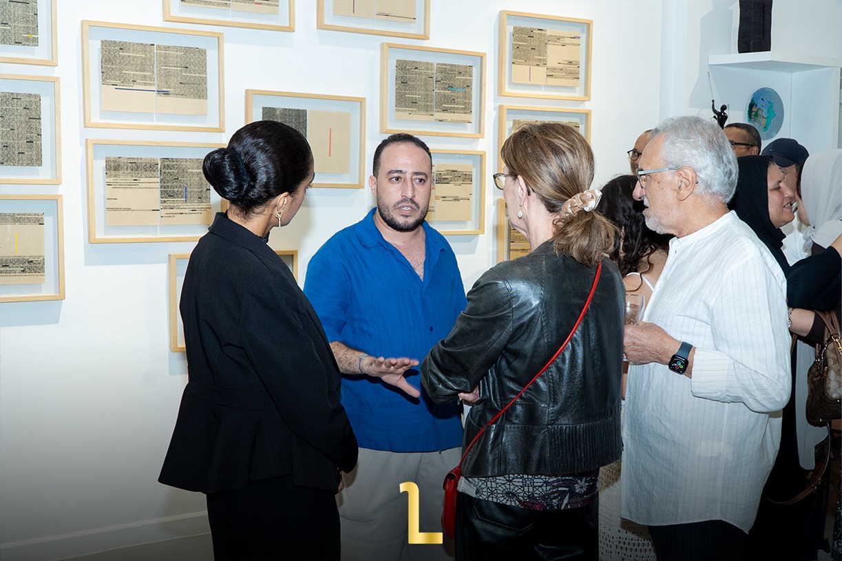 Visitors explore Abdessamad Bouysramne’s “Arraqîm” exhibition at Abla Ababou Galerie in Rabat, discovering works that connect ancestral calligraphy with contemporary art. / MWN Photography Team