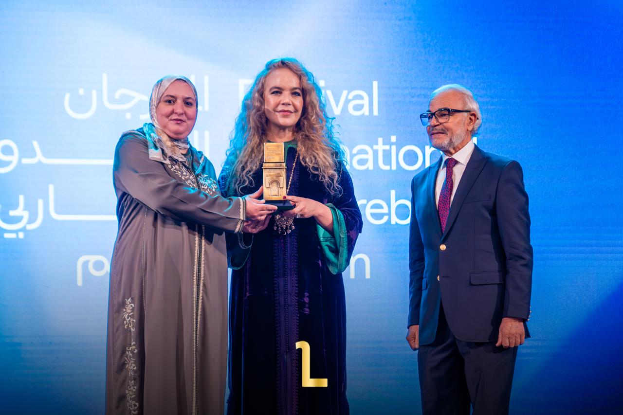 Noufissa Benchehida being honored at Oujda Film Festival